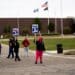 United Auto Workers (UAW) members and supporters on a picket line outside the General Motors Co. Flint Processing Center in Swartz Creek, Michigan, US, on Monday, Sept. 25, 2023. General Motors and Stellantis NV face walkouts at 38 more facilities as talks with their workers' union failed to make headway, even as Ford Motor Co. was spared the escalation after making progress in the negotiations.