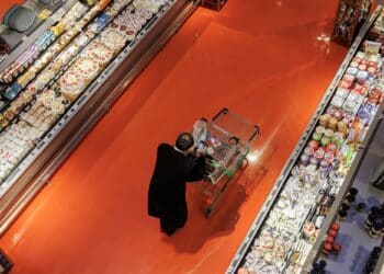 A shopper at a grocery store. Photographer: Cole Burston/Bloomberg