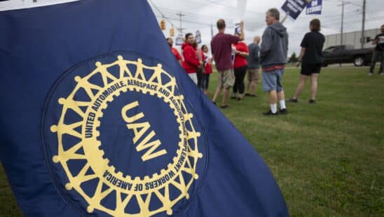 United Auto Workers members strike the General Motors Lansing Delta Assembly Plant in Lansing, Michigan.
