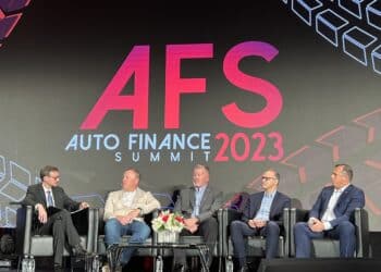 Auto Finance Summit panel execs on stage