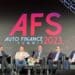 Auto Finance Summit panel execs on stage
