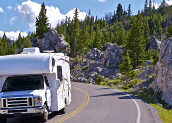 RV riding a long a forest road