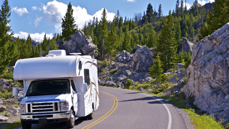 RV riding a long a forest road