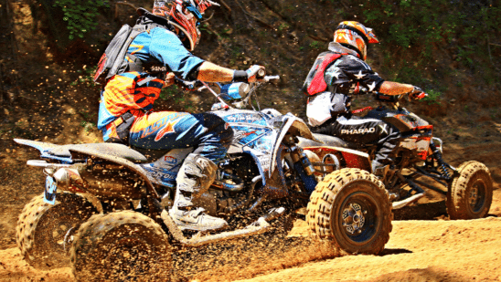 ATVs riding on dirt