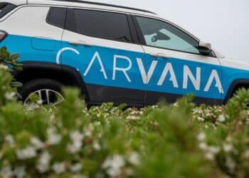 A branded vehicle at a Carvana vending machine in Daly City, California, US, on on Thursday, July 6, 2023. Carvana Co. will restructure its debt and sell shares as the used-car retailer tries to regain its footing following a pandemic boom and bust.