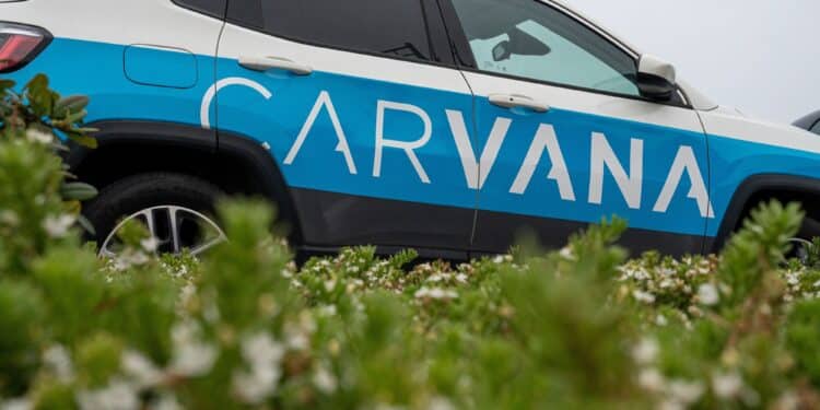A branded vehicle at a Carvana vending machine in Daly City, California, US, on on Thursday, July 6, 2023. Carvana Co. will restructure its debt and sell shares as the used-car retailer tries to regain its footing following a pandemic boom and bust.