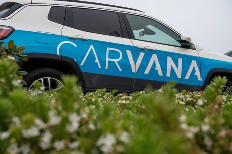 A branded vehicle at a Carvana vending machine in Daly City, California, US, on on Thursday, July 6, 2023. Carvana Co. will restructure its debt and sell shares as the used-car retailer tries to regain its footing following a pandemic boom and bust.