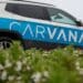 A branded vehicle at a Carvana vending machine in Daly City, California, US, on on Thursday, July 6, 2023. Carvana Co. will restructure its debt and sell shares as the used-car retailer tries to regain its footing following a pandemic boom and bust.