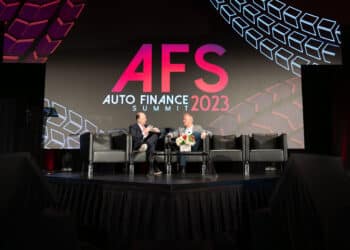 Tom Shortt on stage at Auto Finance Summit 2023