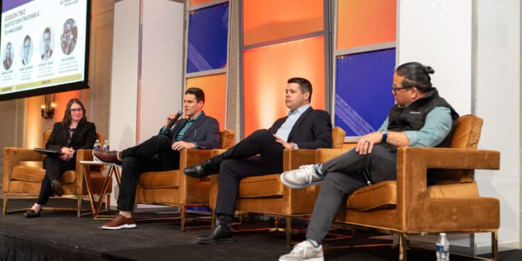 Panelists on stage at the 2023 Powersports Finance Summit