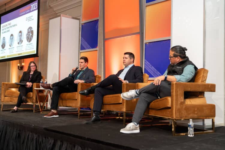 Panelists on stage at the 2023 Powersports Finance Summit