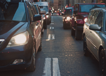 cars on dark road