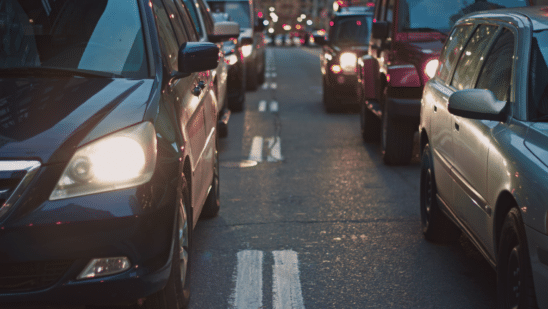 cars on dark road