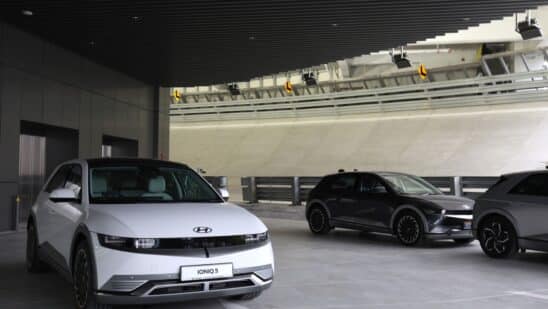 A Hyundai Motor Co. Ioniq 5 electric vehicle (EV) parked next to the rooftop test track at the Hyundai Motor Group Innovation Center Singapore in Singapore, on Tuesday, Nov. 14, 2023. Hyundai Motor Group officially opened a heavily automated facility in Singapore that it expects to play a crucial role in its electrification strategy in the coming decades, deploying robotics and new production methods.