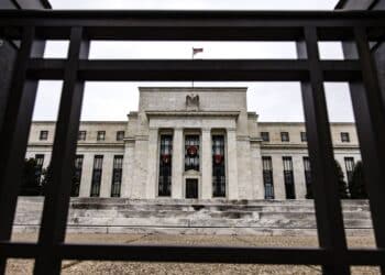 The Marriner S. Eccles Federal Reserve building in Washington, D.C., U.S., on Sunday, Dec. 19, 2021. The Federal Reserve chair has tempered his ambition to restore the labor market to its pre-pandemic strength, as the central bank confronts surging inflation and a workforce still constrained by Covid-19.