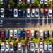 Overhead shots are cars parked along a road