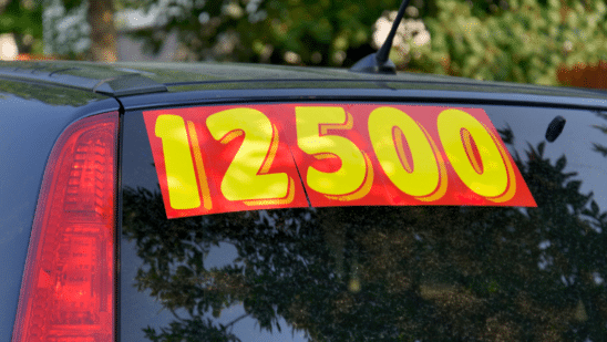 Car with a price sticker on the back window