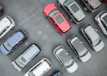 Overhead shot of cars in a dealer lot