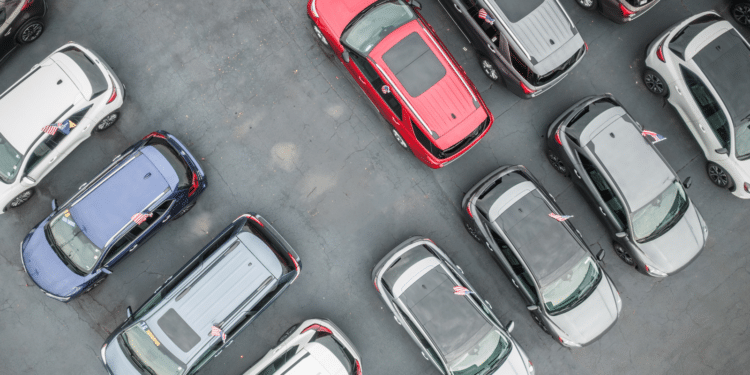 Overhead shot of cars in a dealer lot