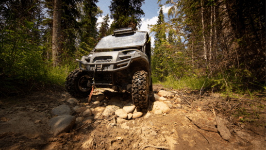 UTV climbing rocks