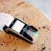 A receipt sits in a payment terminal