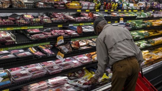 A customer shops for groceries in a supermarket in San Francisco.