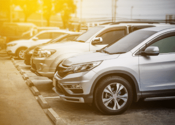 cars on lot with sunset