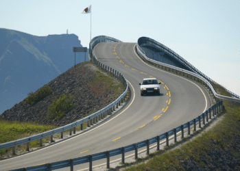 white car on windy road