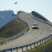 white car on windy road