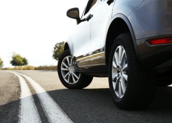 car on road close up on tires