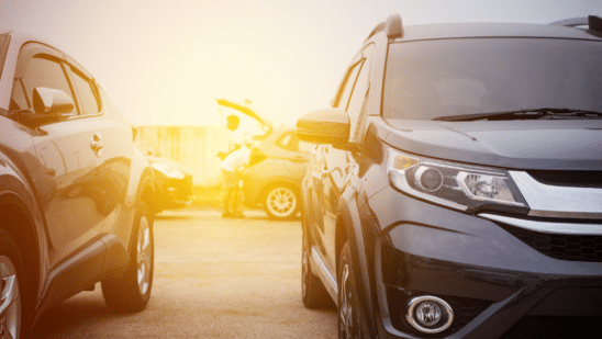 car dealership with sunset