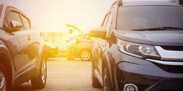 car dealership with sunset