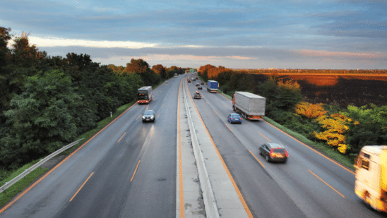 cars on highway far away view