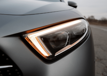 Close up of gray car headlight