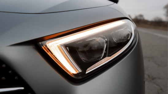 Close up of gray car headlight
