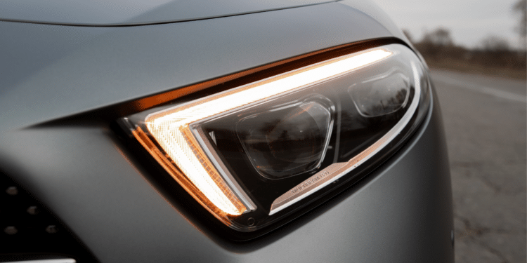 Close up of gray car headlight
