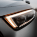 Close up of gray car headlight