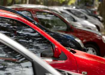 Cars lined up in a parking lot