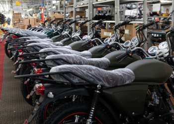 New motorcycles lined up in a dealer