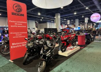 motorcycles on show floor at AIM expo