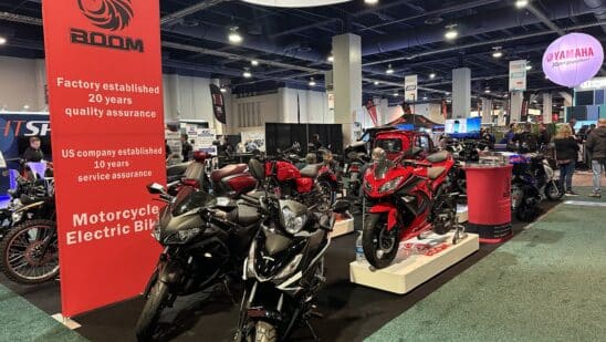motorcycles on show floor at AIM expo