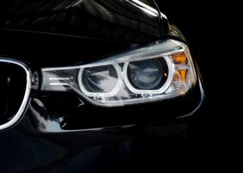 Close up of black car headlight