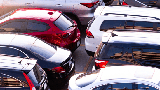 close up new cars on lot