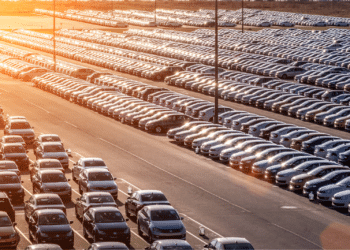 new cars parked at distribution center