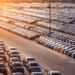 new cars parked at distribution center