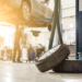 car service center, car raised up, tires in front
