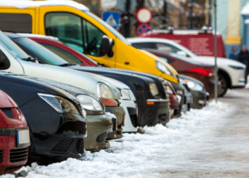 Cars parked along a street curb