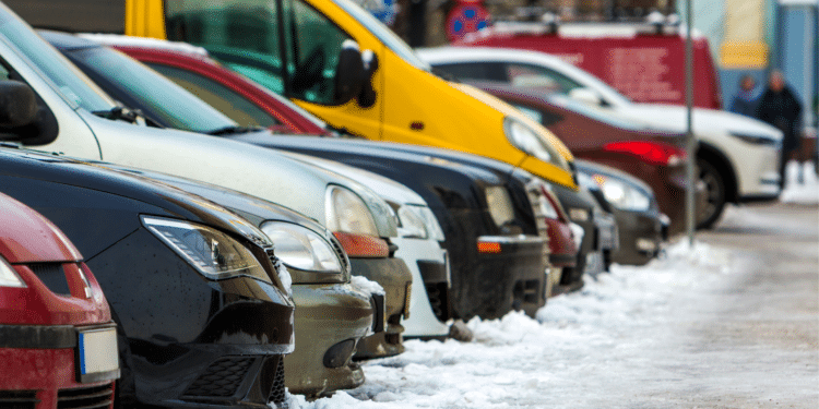 Cars parked along a street curb