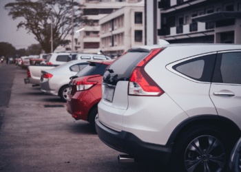 Cars parked along a building