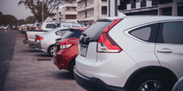 Cars parked along a building